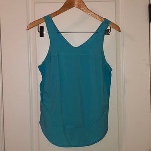 Blue Lululemon exercise tank with slit back small